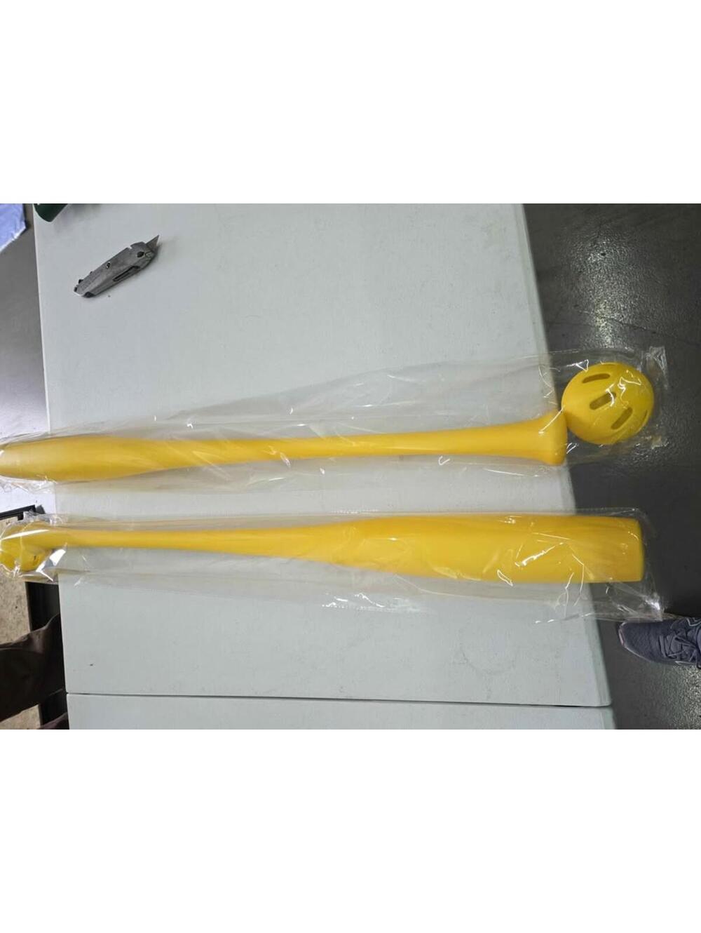 Pair of plastic baseballs & bats